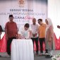 Keluarga Alumni Universitas Gadjah Mada atau KAGAMA menyerahkan 26 unit hunian sementara untuk korban bencana hidrometeorologi di Desa Sekumur, Kecamatan Sekerak, Aceh Tamiang, Minggu 5/7/2026. 